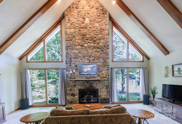 living room with a textured ceiling, a stone fireplace, light carpet, high vaulted ceiling, and beam ceiling