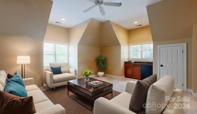 living room featuring ceiling fan and carpet floors