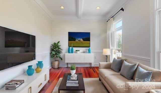 living room featuring ornamental molding, wood-type flooring, and beam ceiling