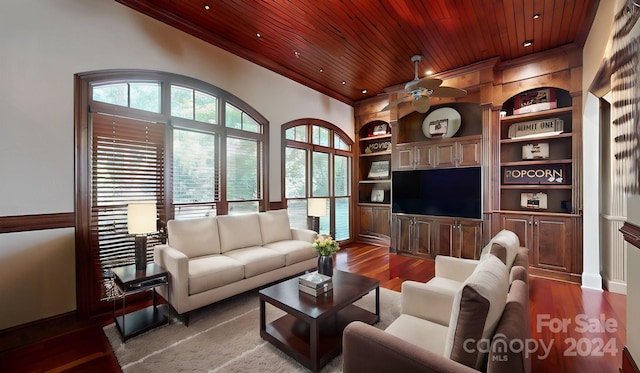 living room with wood ceiling, hardwood / wood-style flooring, crown molding, ceiling fan, and built in features