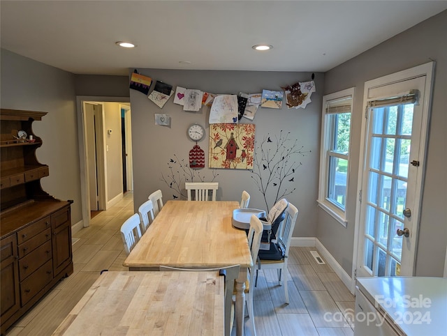 dining room featuring light hardwood / wood-style flooring