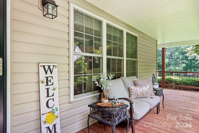 wooden deck with a porch