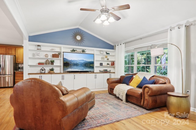 living room featuring ceiling fan, light hardwood / wood-style floors, vaulted ceiling, and ornamental molding