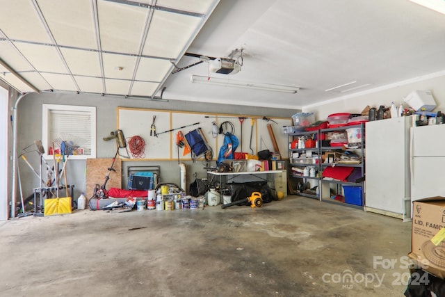 garage featuring a garage door opener