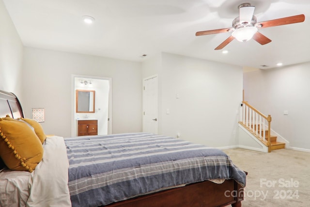 carpeted bedroom featuring connected bathroom and ceiling fan