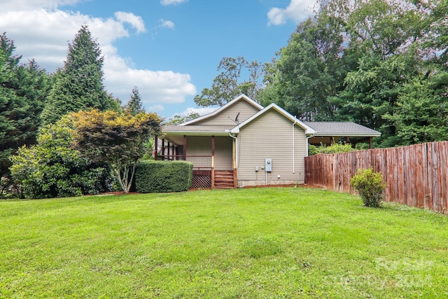 exterior space with a lawn