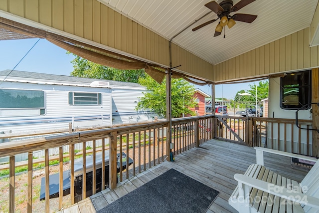 wooden terrace with ceiling fan