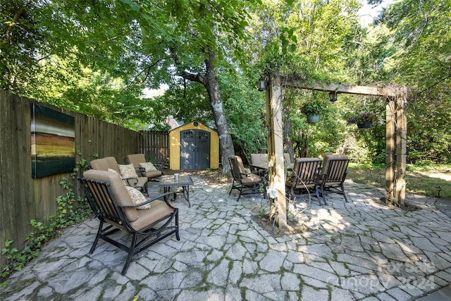 view of patio / terrace with a storage shed