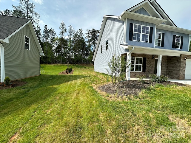 view of home's exterior featuring a lawn