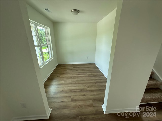 empty room featuring hardwood / wood-style flooring