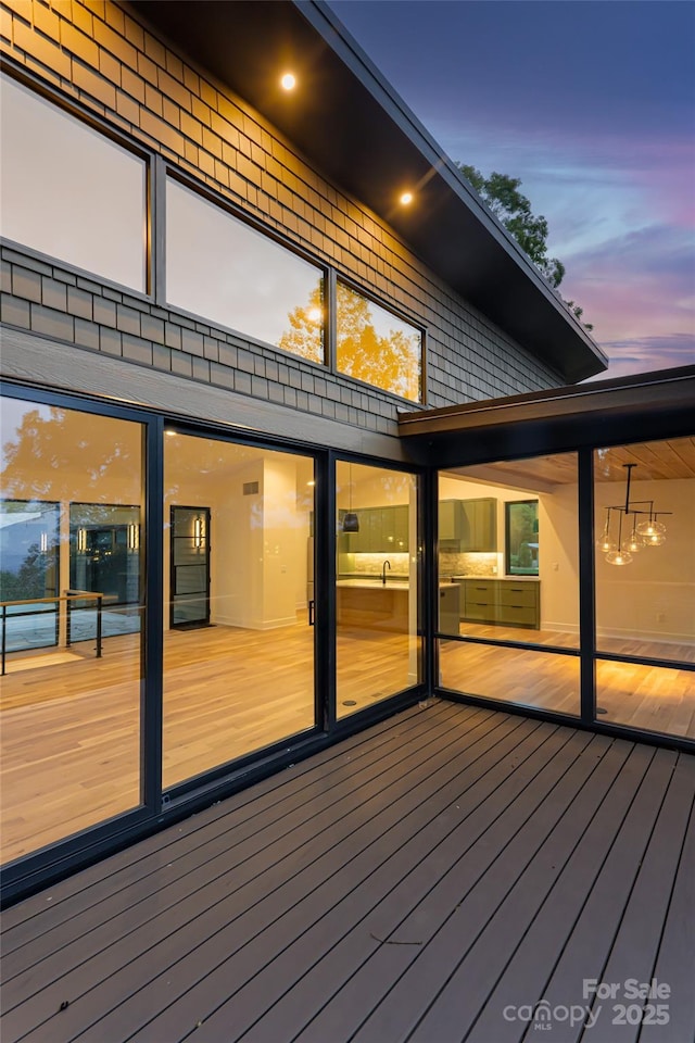 view of deck at dusk