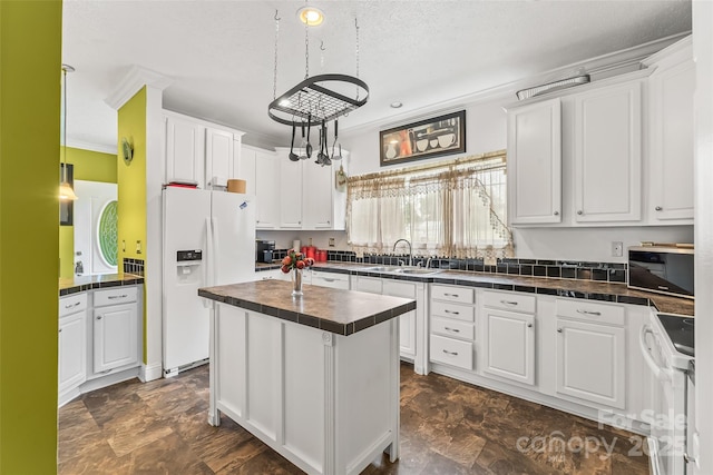 3951 Springs Rd, Conover, NC 28613 - kitchen with white appliances, a sink, white cabinets, ornamental molding, and a center island