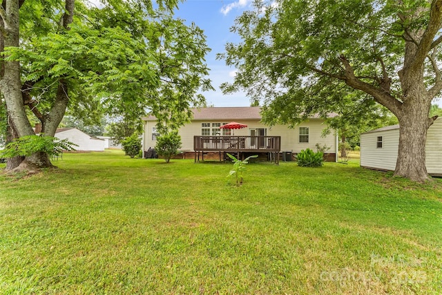 3951 Springs Rd, Conover, NC 28613 - view of green lawn with a wooden deck