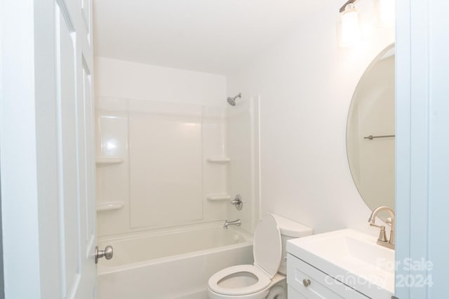 full bathroom featuring vanity, toilet, and bathing tub / shower combination