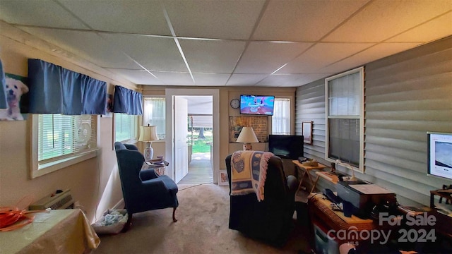 interior space featuring a paneled ceiling