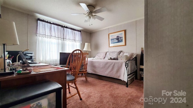 bedroom featuring carpet flooring, ceiling fan, and ornamental molding