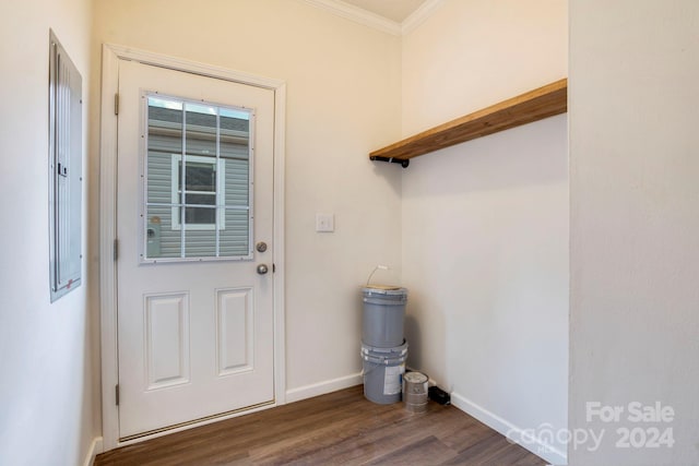 doorway featuring dark hardwood / wood-style floors and ornamental molding