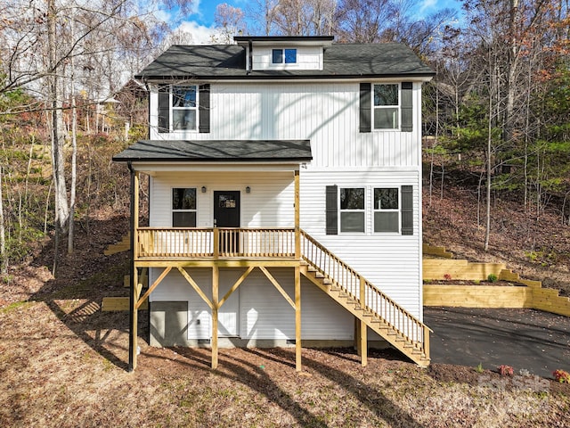 view of front of property featuring a wooden deck