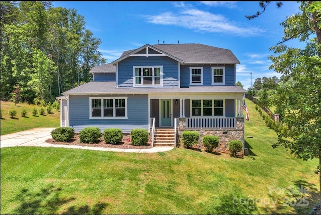 view of front of house with covered porch and a front lawn