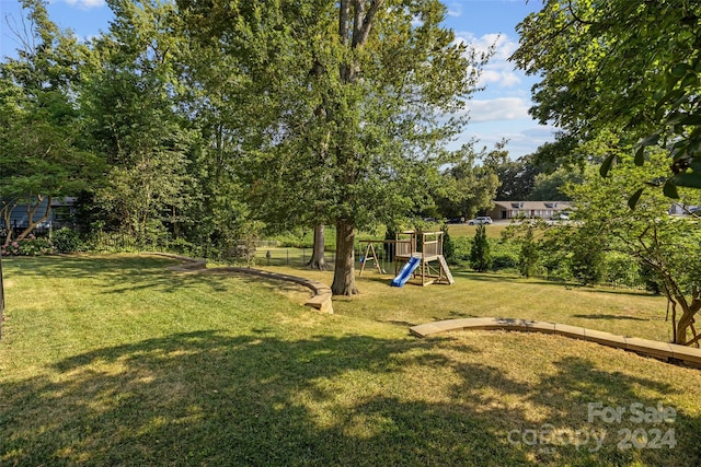 view of yard featuring a playground