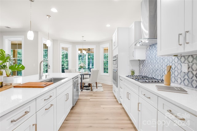 kitchen featuring white cabinets and pendant lighting