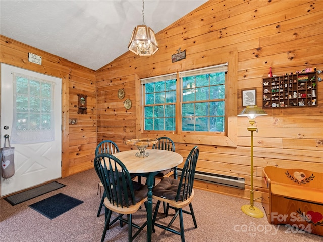 carpeted dining room with wood walls, baseboard heating, and lofted ceiling