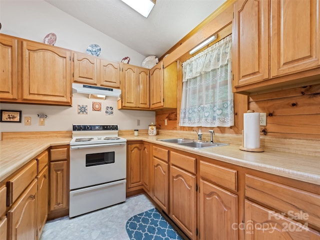 kitchen featuring lofted ceiling, white electric range, and sink