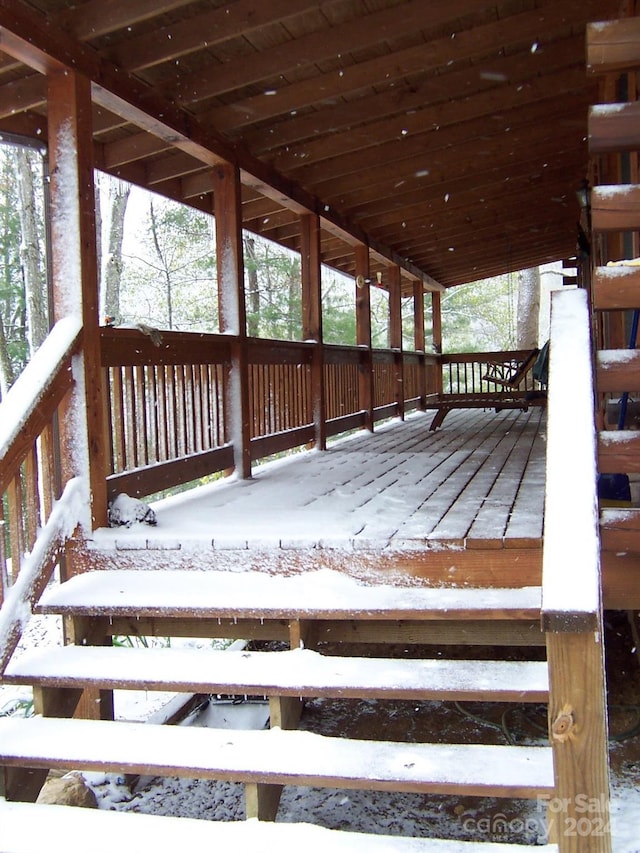 view of snow covered deck