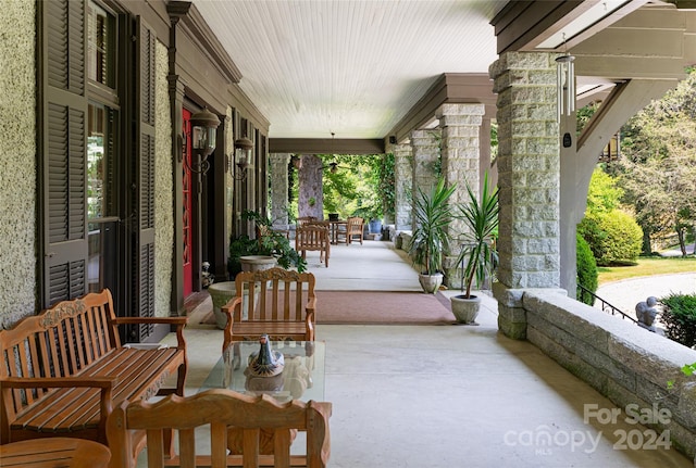 view of patio featuring covered porch