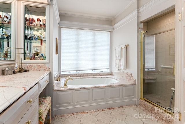 bathroom with tile patterned flooring, vanity, crown molding, and shower with separate bathtub