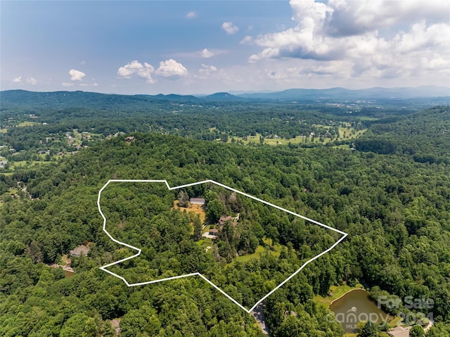 bird's eye view with a mountain view