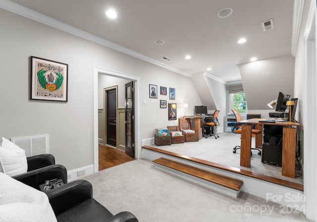 office area with hardwood / wood-style floors and crown molding