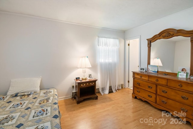 bedroom featuring light hardwood / wood-style flooring