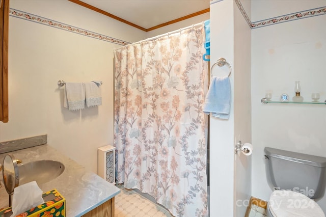 bathroom featuring crown molding, vanity, a shower with shower curtain, and toilet