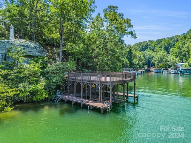 view of dock with a water view