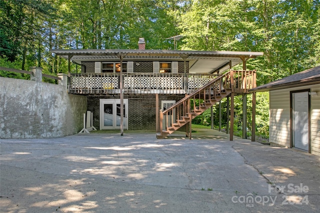 view of front of house with a wooden deck