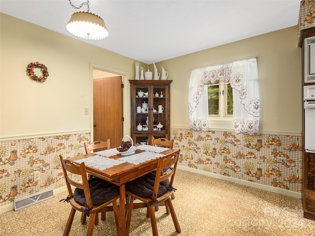 view of carpeted dining room