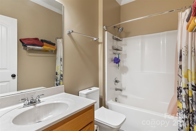 full bathroom featuring toilet, vanity, crown molding, and shower / bath combo with shower curtain