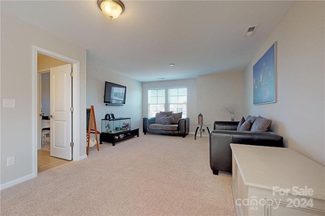 living room featuring light colored carpet