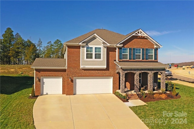 view of front of house featuring a front lawn, a porch, and a garage