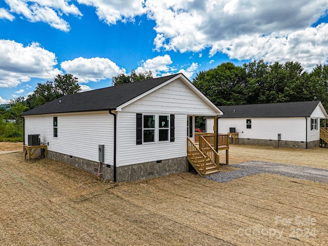 view of front of property with central AC