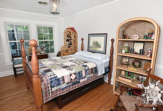 bedroom featuring hardwood / wood-style flooring