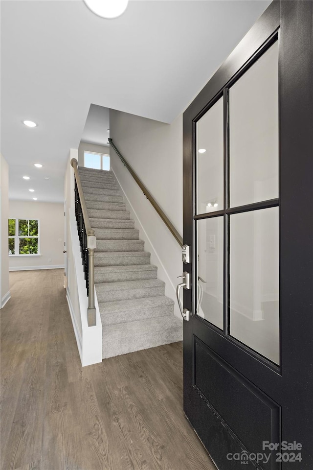 foyer with hardwood / wood-style flooring