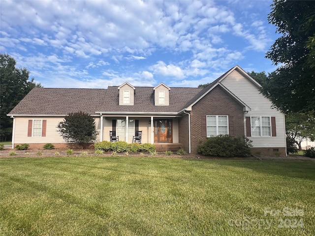 view of front of home with a front lawn and a porch