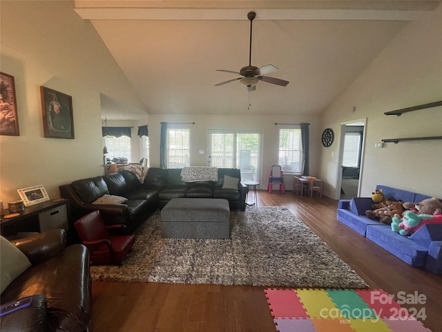 living room featuring ceiling fan, a healthy amount of sunlight, and dark hardwood / wood-style flooring