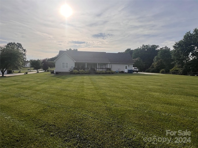 view of front of property with a front lawn