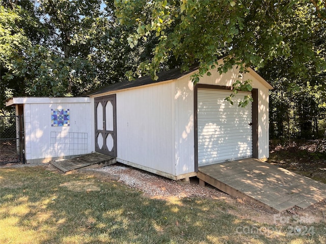 garage with a lawn