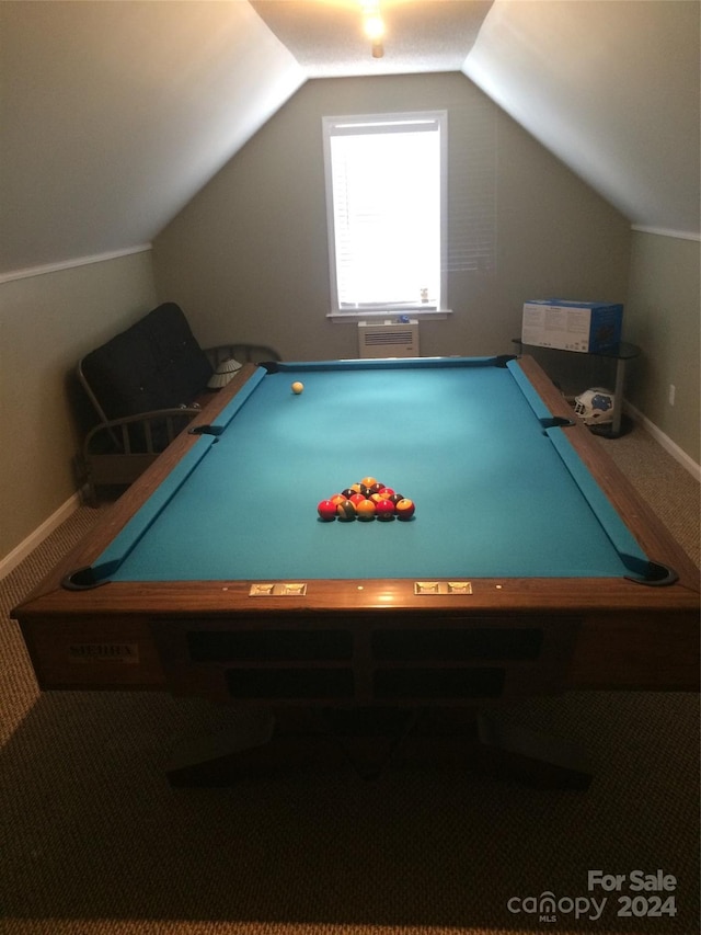 playroom featuring lofted ceiling and carpet flooring