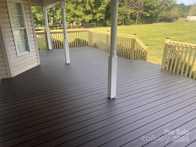 deck featuring a lawn