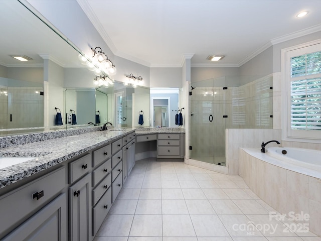 bathroom featuring tile patterned flooring, vanity, crown molding, and separate shower and tub